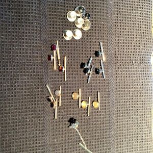 Tuxedo buttons and one black stone tie tack